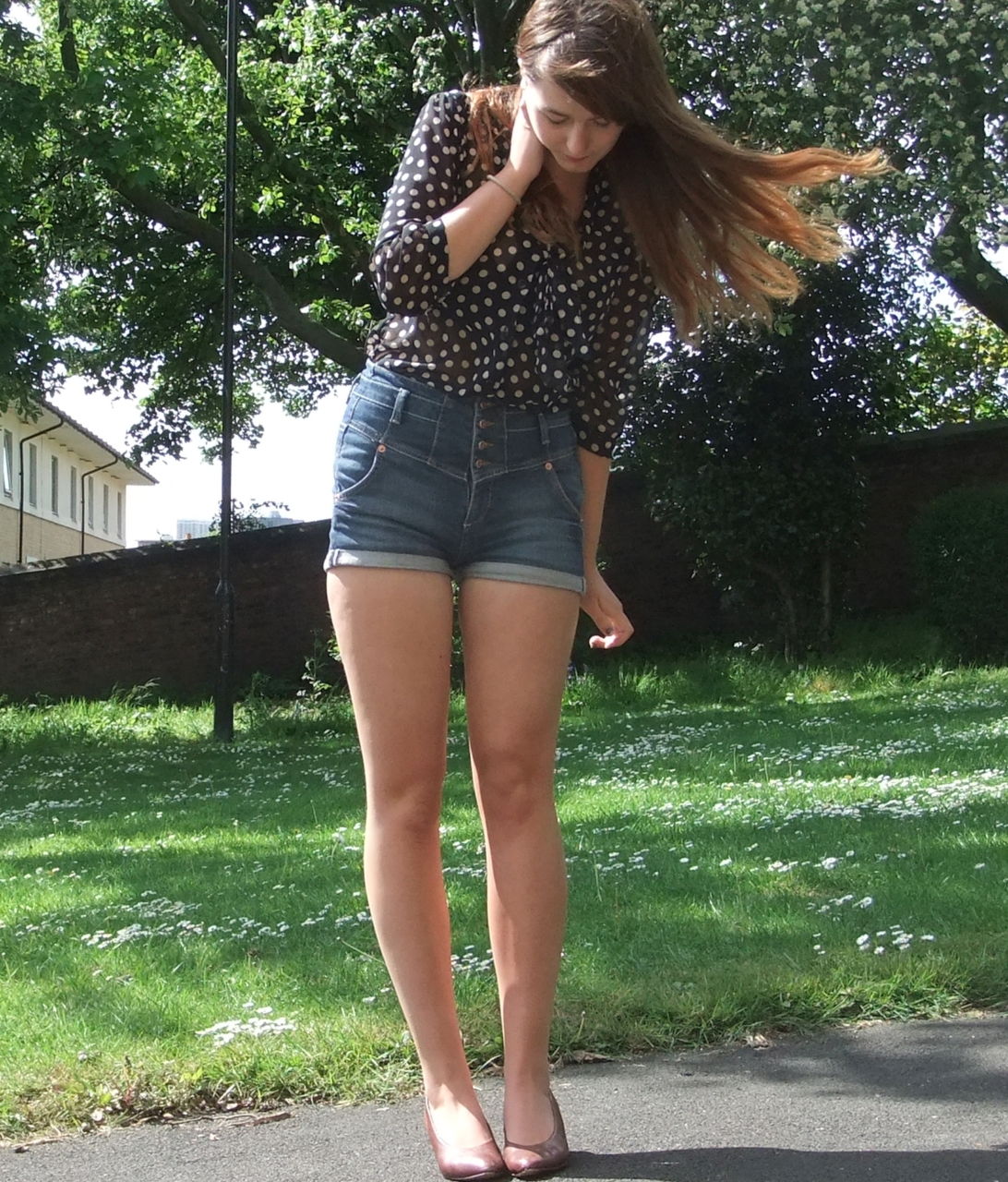 Polka dot blouse with denim shorts and vintage shoes