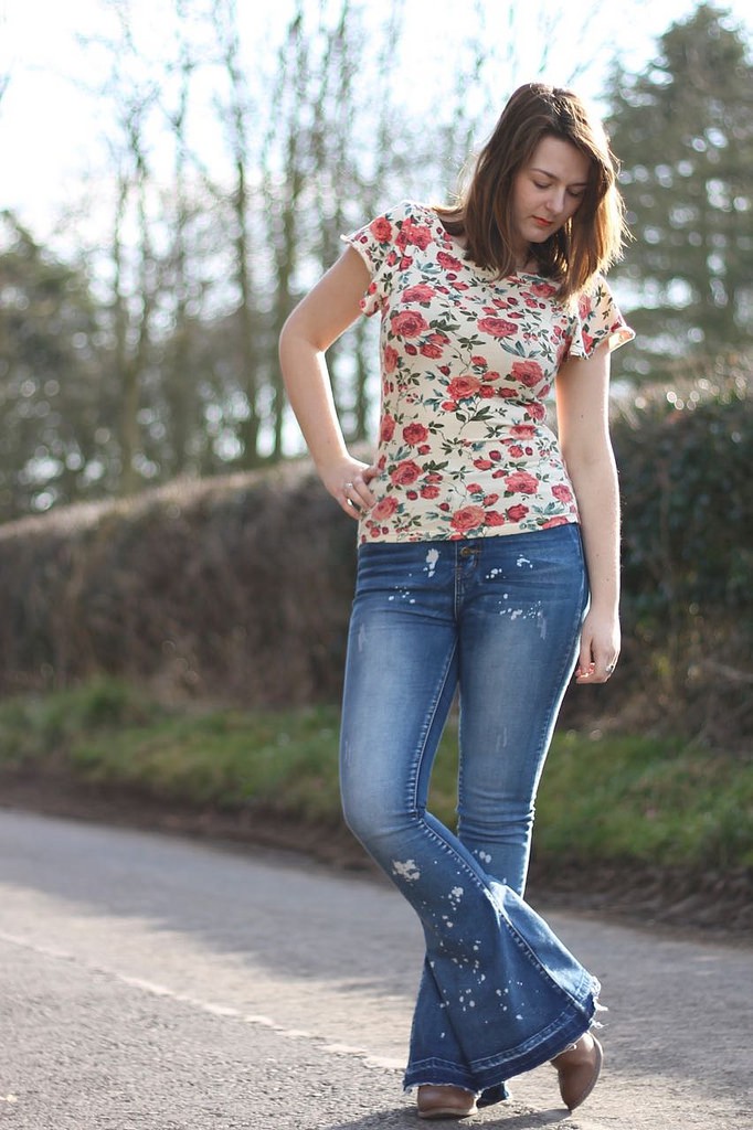 floral tee with flared jeans