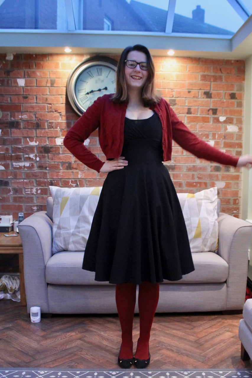 Collectif dress with red tights & cardigan
