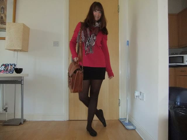 Pink jumper with black skirt