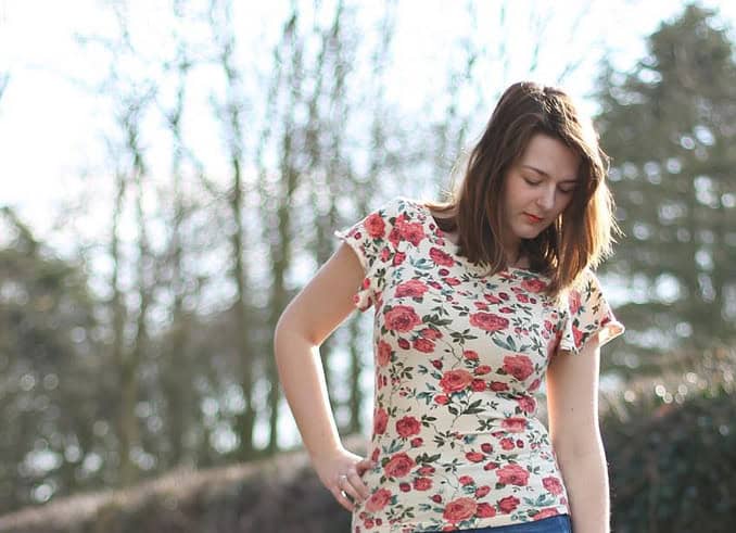 floral tee with flared jeans