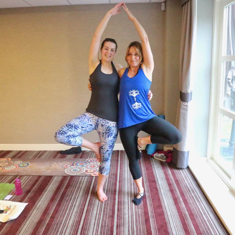 SUP Yoga retreat North Yorkshire at Raithwaite Estate - partner yoga tree pose