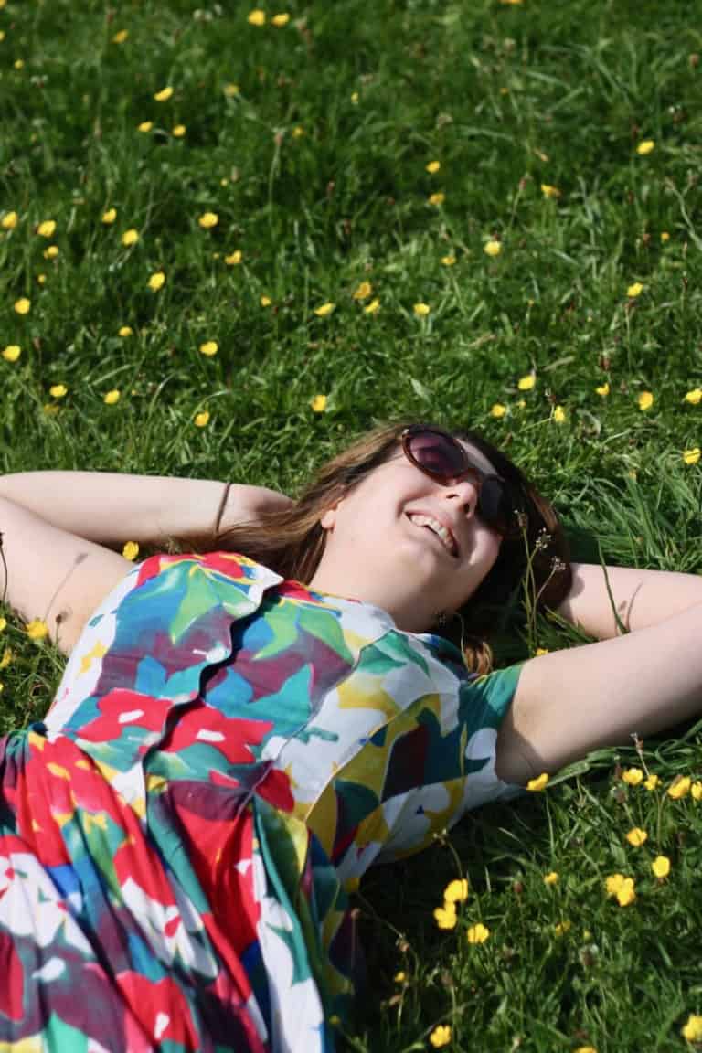 Vintage floral dress in buttercup meadow at Fountains Abbey